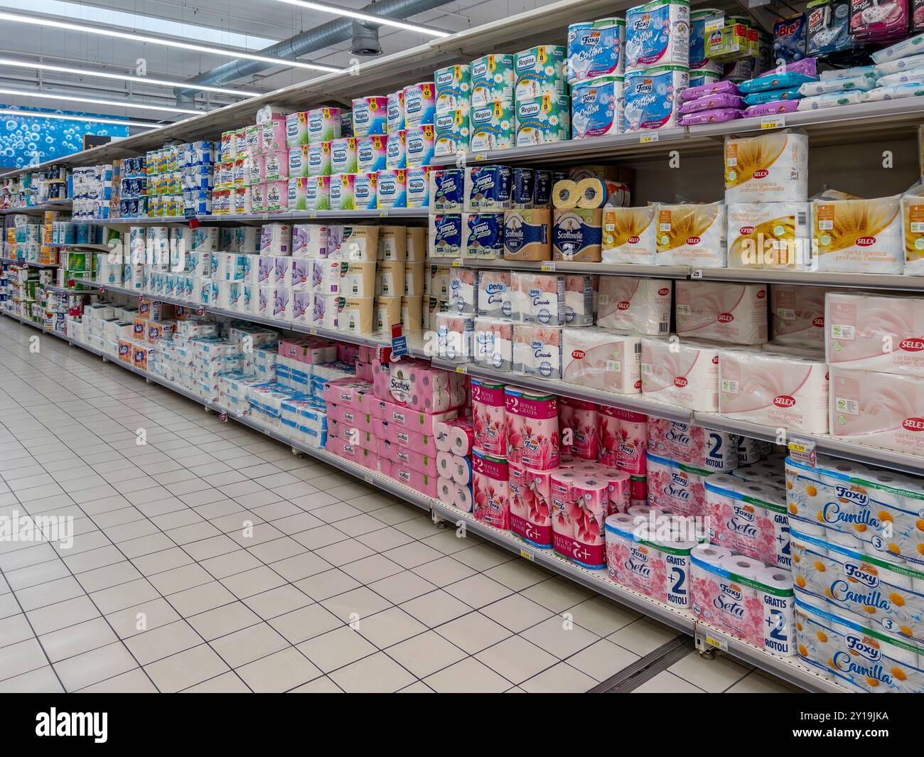 Italy - July 24, 2024: Toilet paper rolls in packs of various types and ...