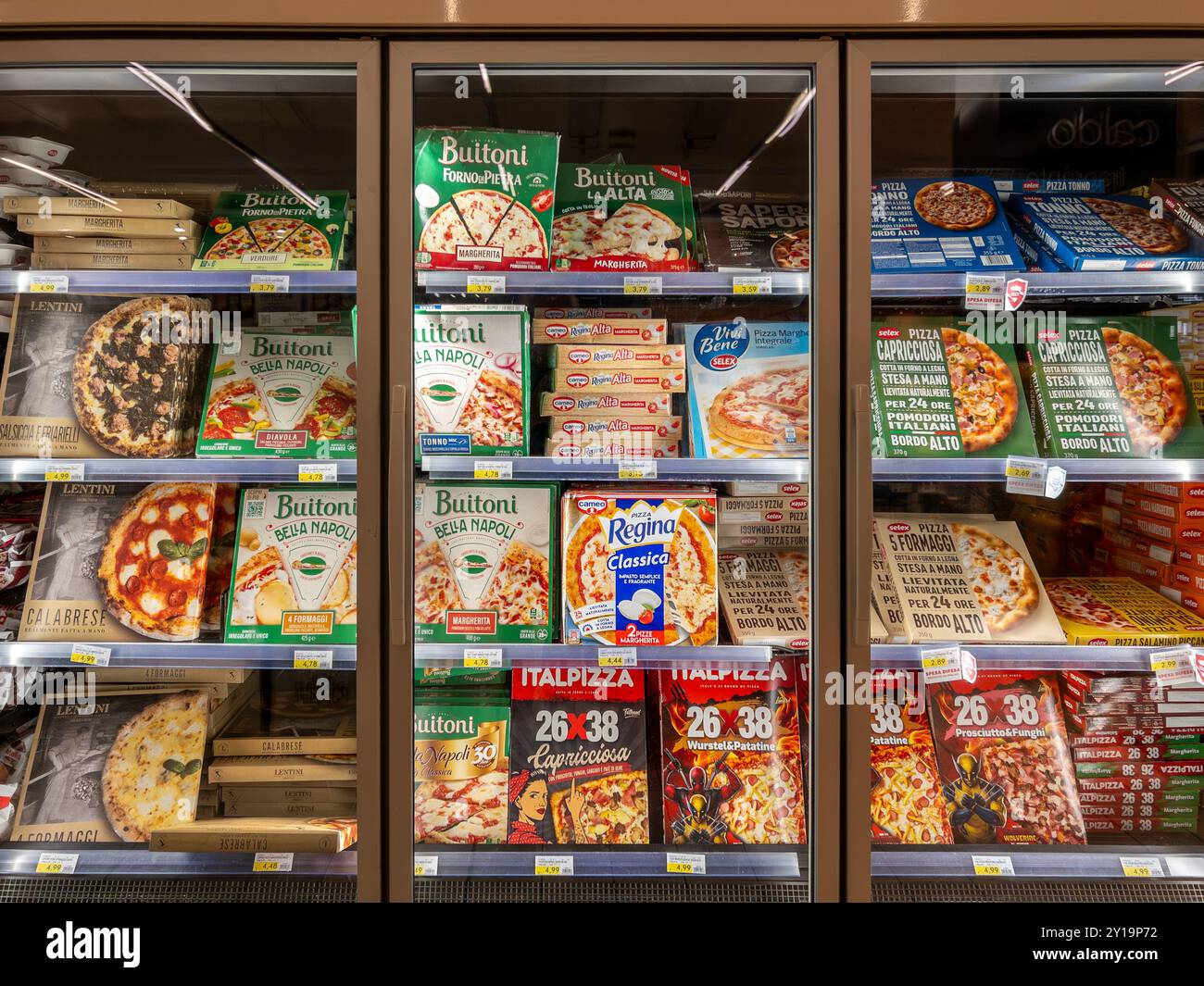 Italy - July 24, 2024: Frozen pre-cooked pizzas of various types and