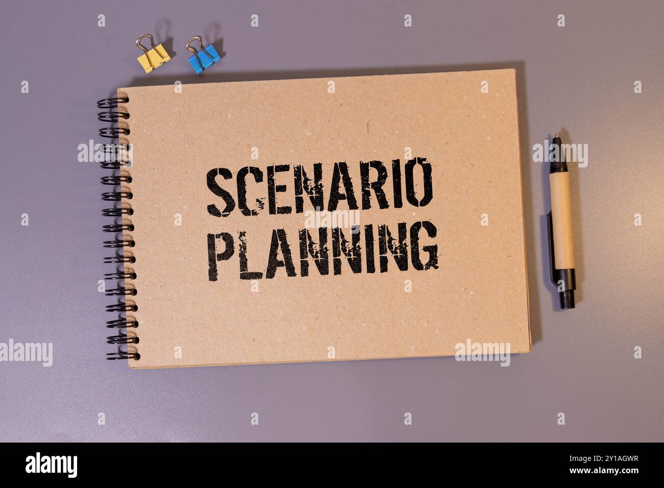 Scenario planning is shown using a text. Stock Photo
