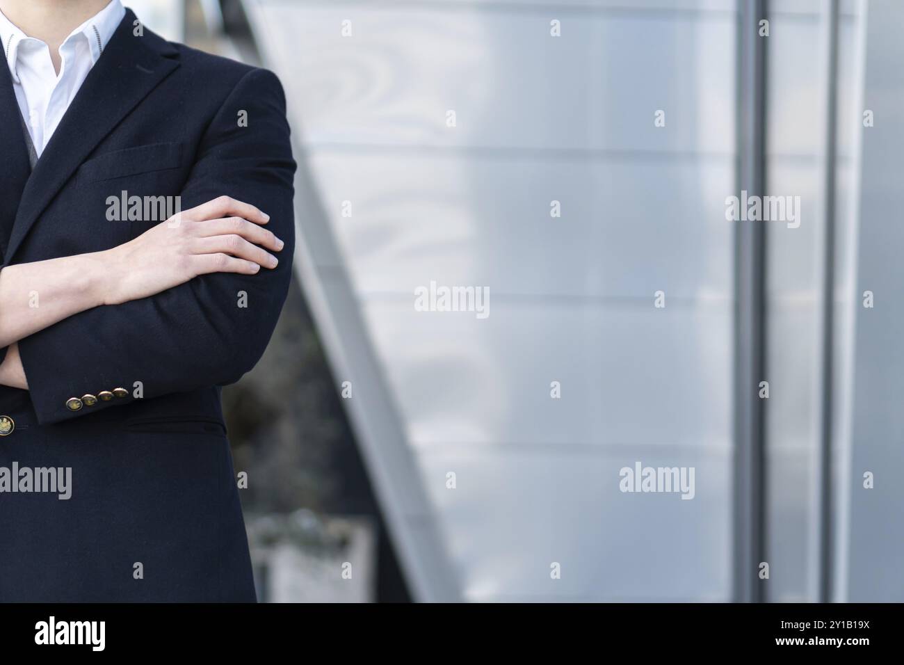 Photo of business man in classic black suit, shirt holding hands folded Achievement career wealth business concept. copy space Stock Photo