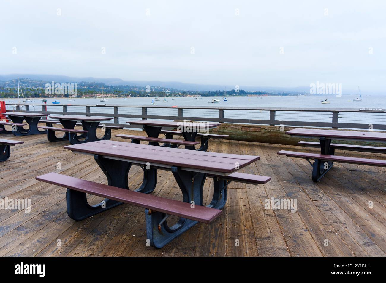 Santa Barbara, California - April 20, 2024: Scenic picnic area with tables overlooking the bay, providing a perfect spot for gatherings in Santa Barba Stock Photo