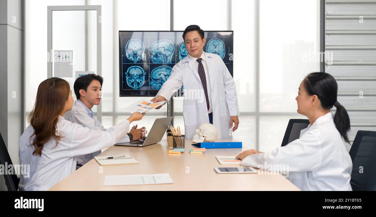 Medical team discussing mri scans hi-res stock photography and images ...