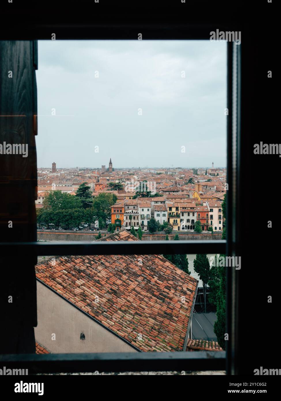 A beautiful vista reveals the sprawling rooftops and historic buildings ...