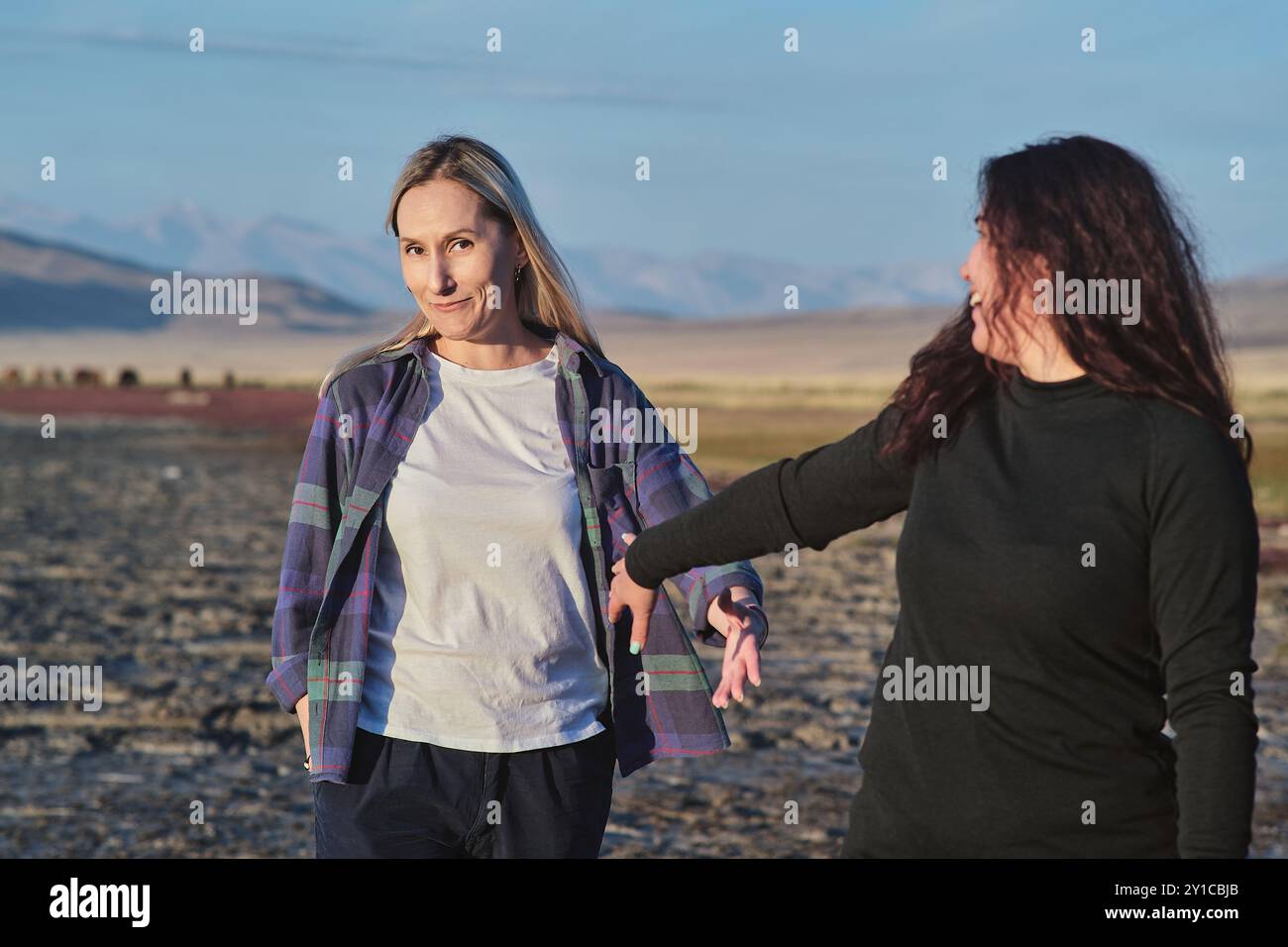 Two women smiling together in hi-res stock photography and images - Alamy