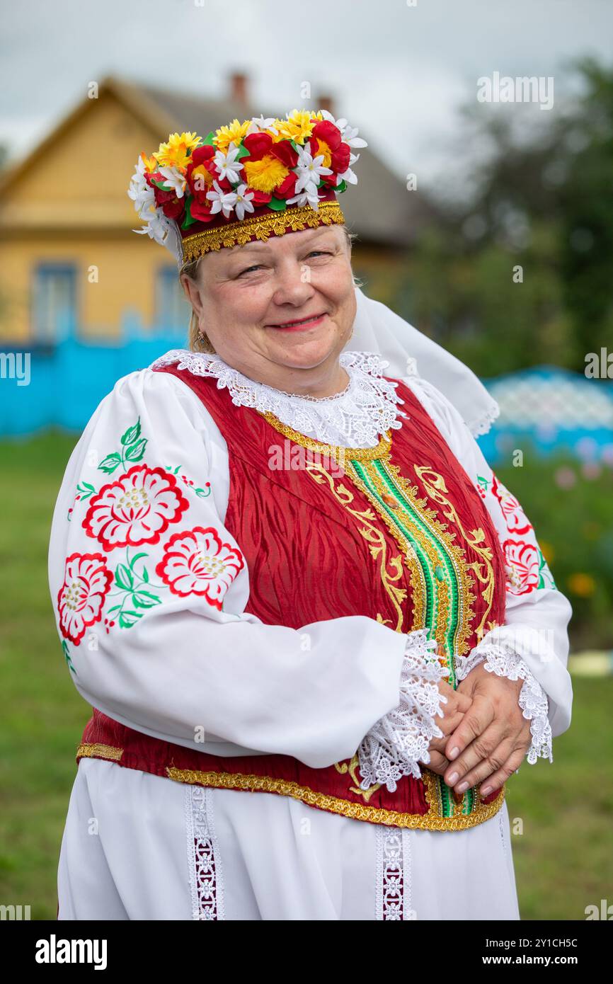 Elderly woman in white clothes hi-res stock photography and images - Alamy