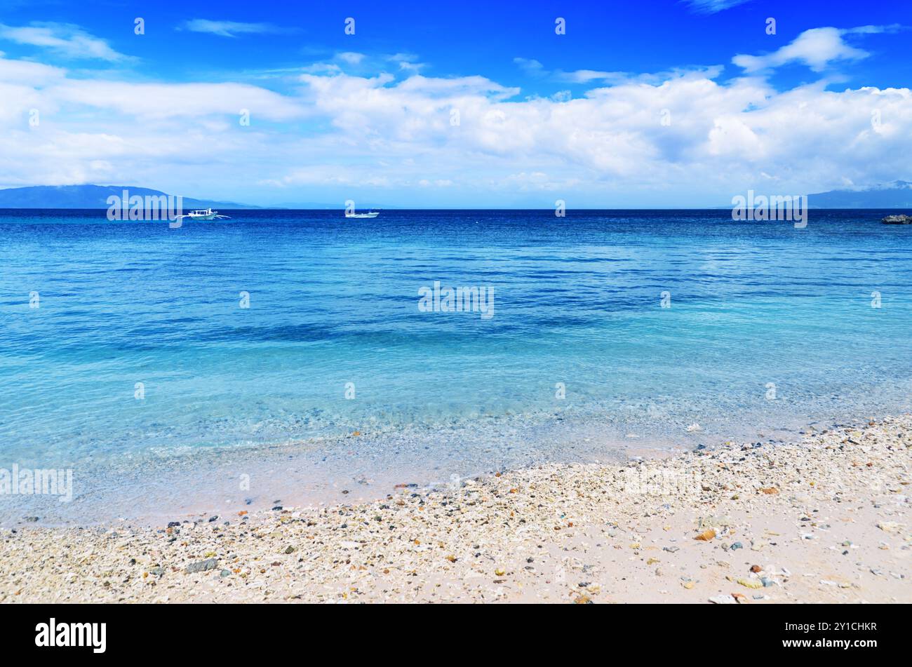 Tropical beach. Blue sky and clear water Stock Photo - Alamy