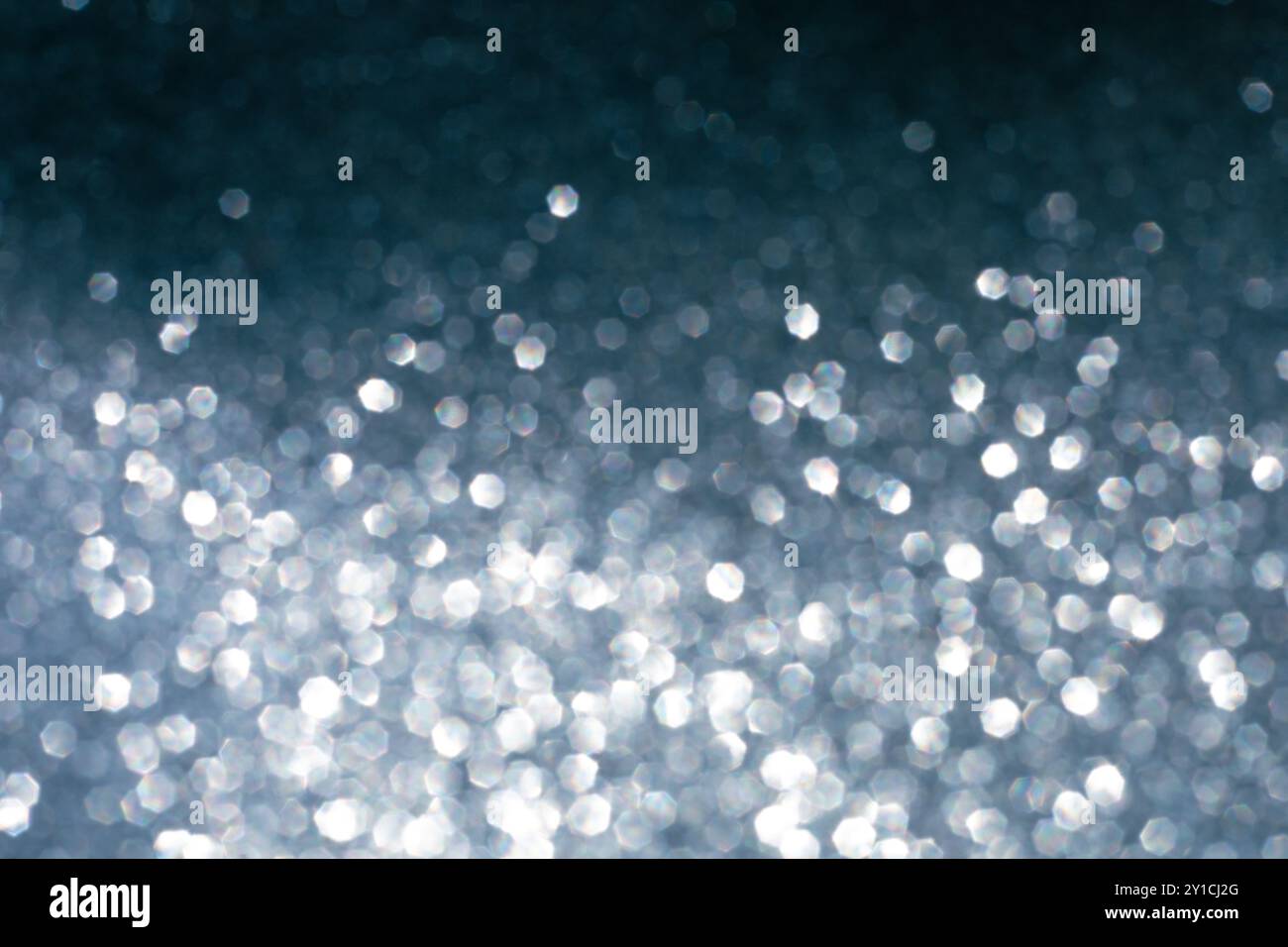 Abstract glitter lights textured background Stock Photo - Alamy