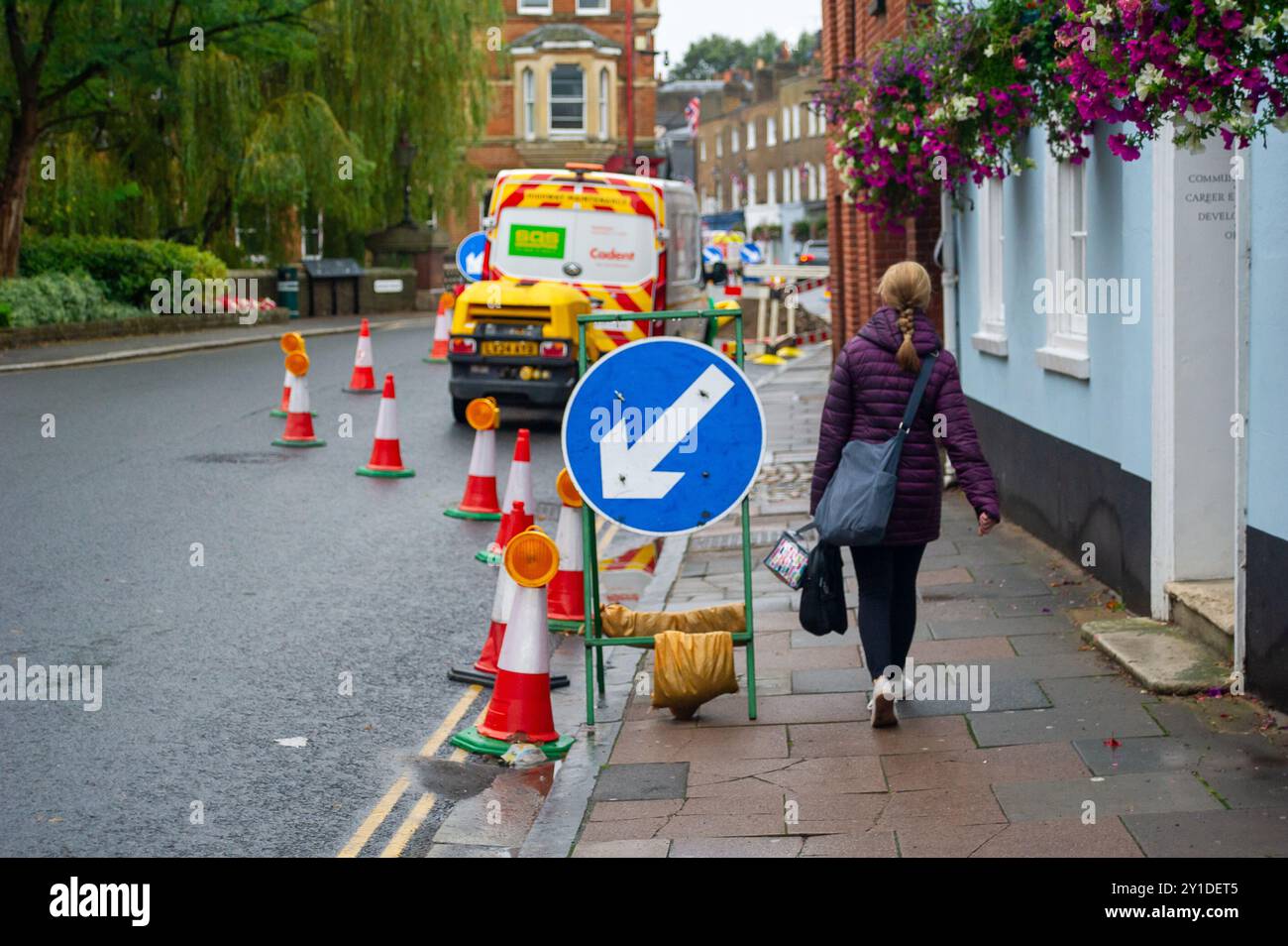 Eton, UK. 6th September, 2024. Gas network contractors working for Cadent remain in Eton High Street, Eton, Windsor, Berkshire removing water from gas pipes following an alleged burst Thames Water pipe. Many households in Eton High Street have had no gas supplies since earlier this week. Cadent are advising householders not to try and turn on their gas supplies until a Cadent Engineer has visited their homes. Over 12,000 litres of water have been pumped out so far, however, there is still water in the gas pipes. Over 30 engineers and support staff are on site. Part of Eton High Street has temp Stock Photo