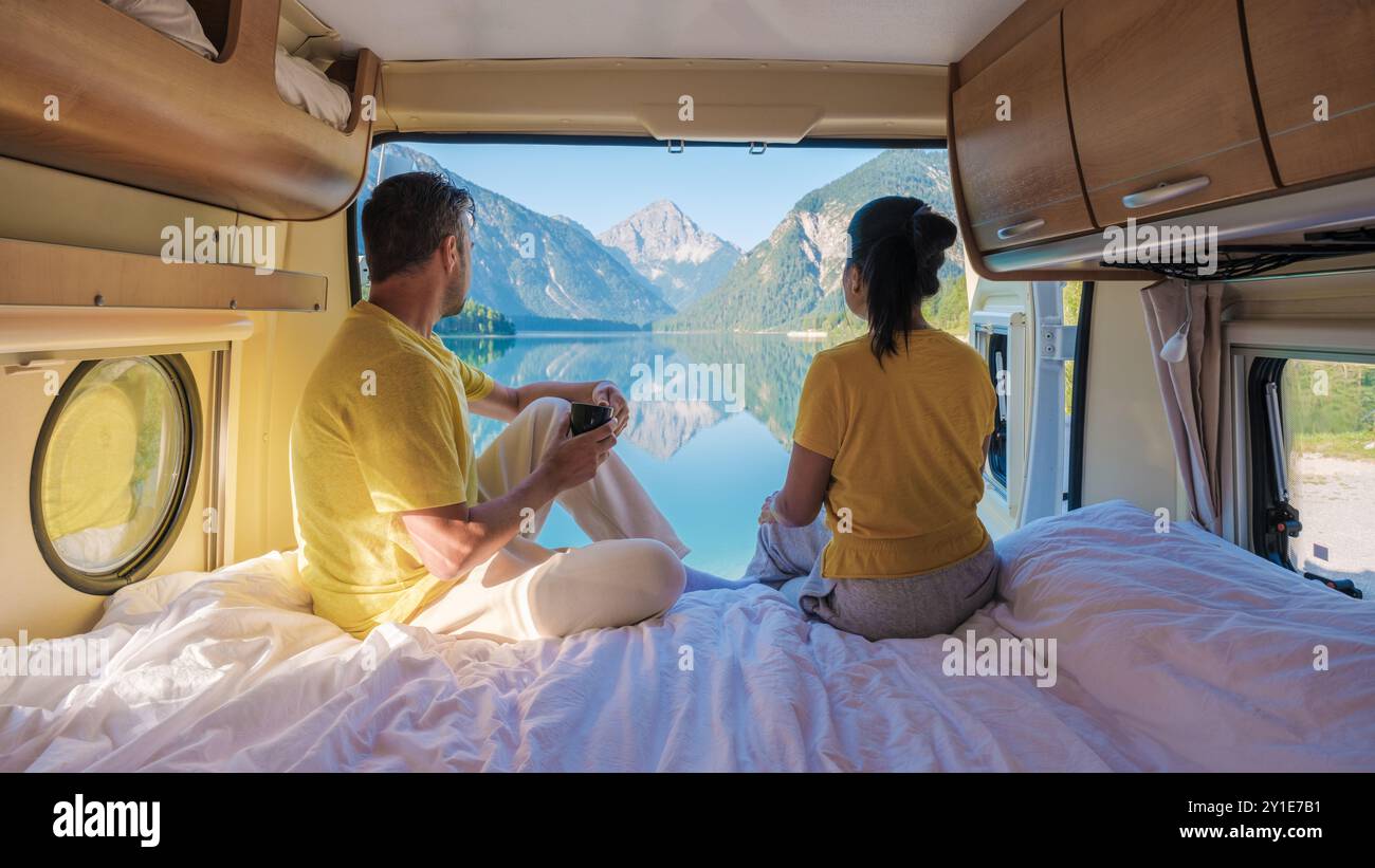 Couple enjoys serene sunrise hi-res stock photography and images - Alamy