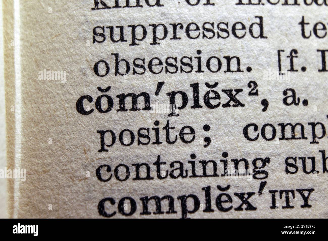 Word complex on dictionary page, macro close-up Stock Photo