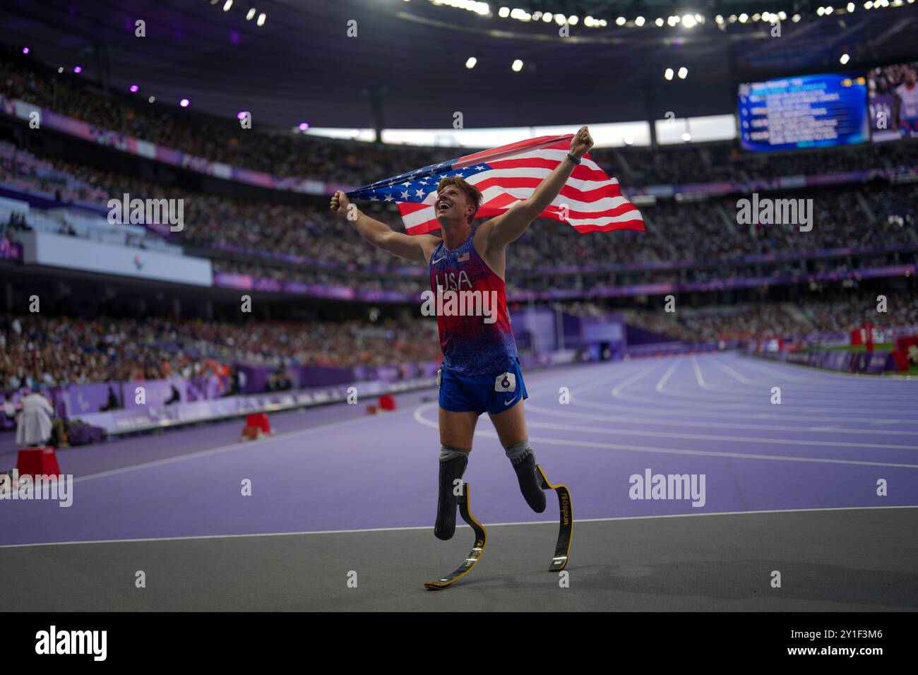 Hunter Woodhall from the U.S. celebrates after winning the men