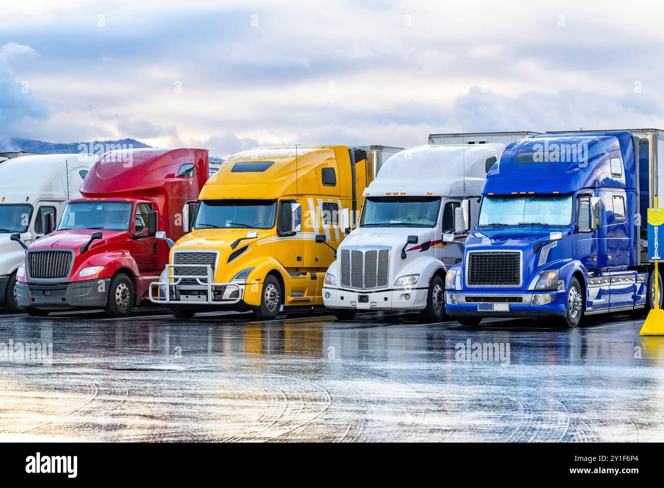 Industrial long hauler carriers big rig semi trucks with loaded semi ...