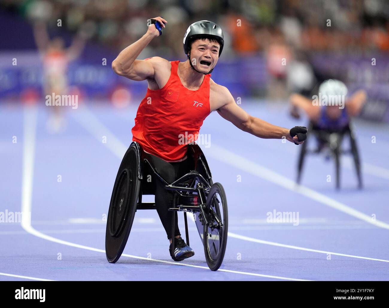 China's Yang Hu celebrates gold in the 4x100m Universal Relay Final at ...