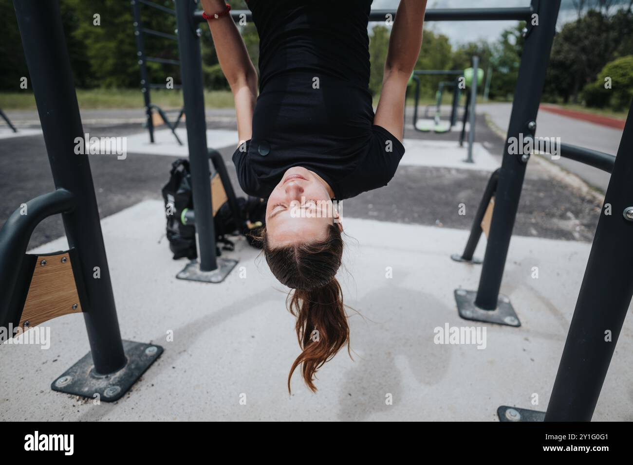 Woman hanging upside down from hi-res stock photography and images - Alamy