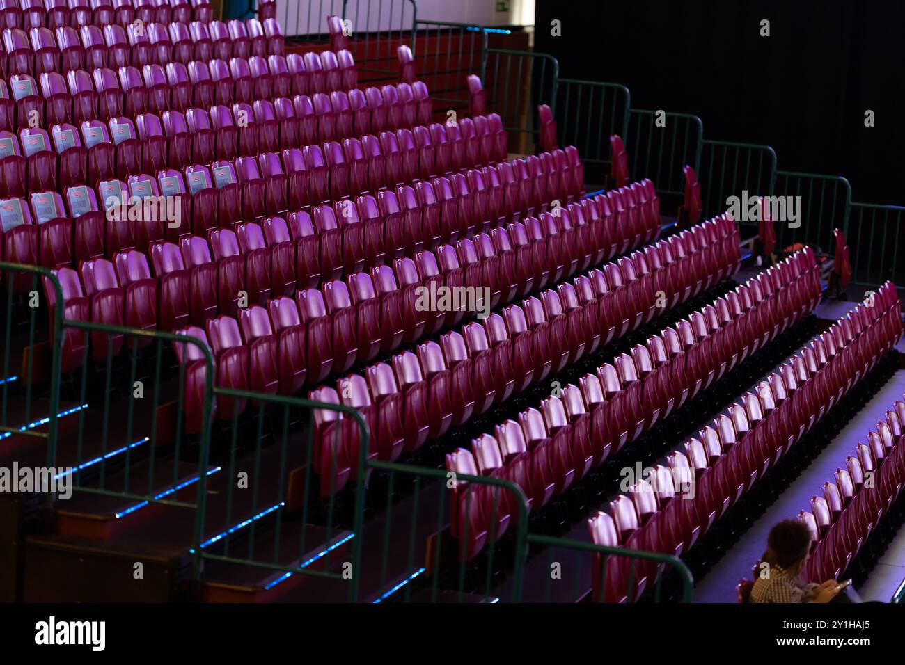 Rows of red seats of an empty stadium Stock Photo - Alamy