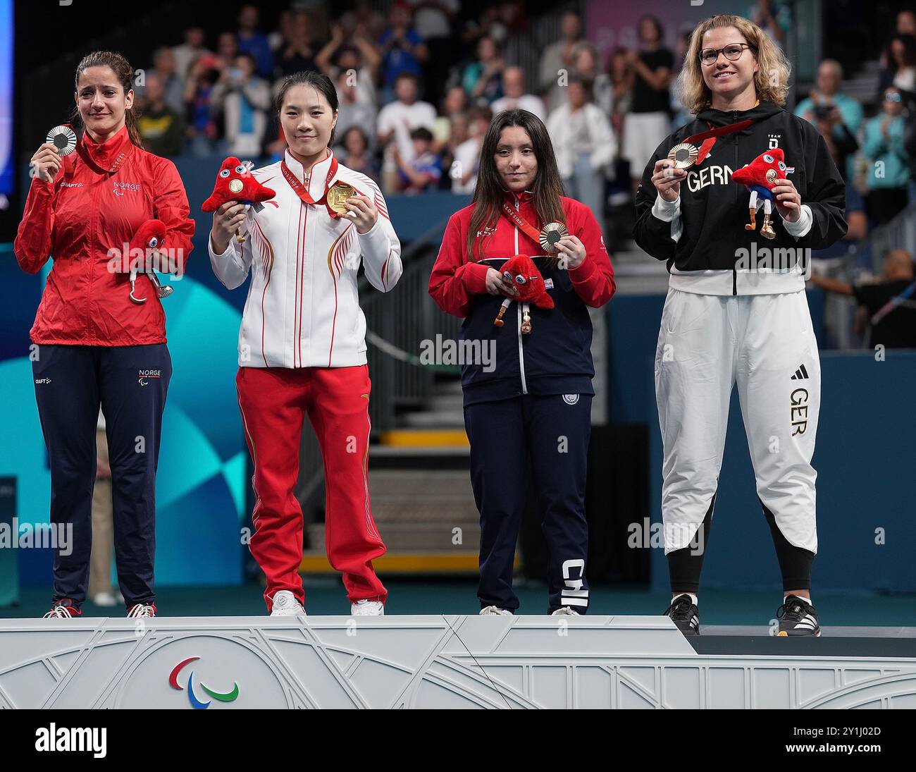 Paris, France. 7th Sep, 2024. Gold medalist Huang Wenjuan (2nd L) of ...