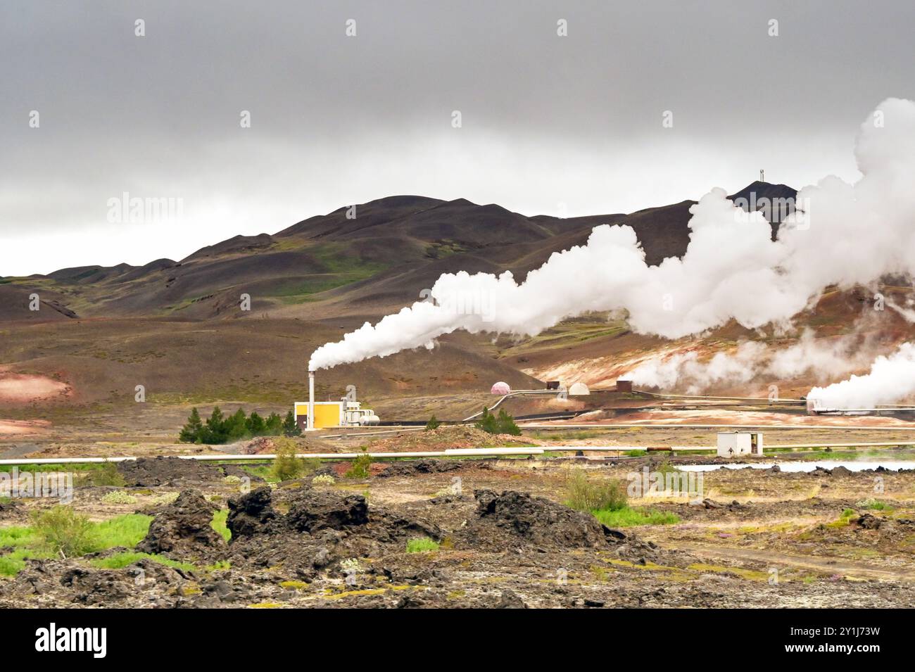 Hverir, Iceland - 24 August 2024: Steam rising from the chimneys of a ...