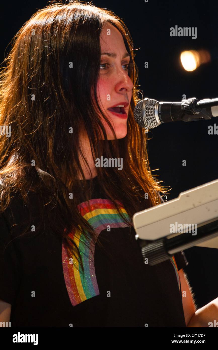 STEALING SHEEP, YOUNG, CONCERT, GREEN MAN FESTIVAL 2012: Rebecca Hawley from a young early tour Stealing Sheep playing live on the Far Out Stage at the Green Man Festival 2012 at Glanusk Park, Brecon, Wales, August 2012. Photo: Rob Watkins. INFO: Stealing Sheep is a British electronic pop band known for their experimental sound and dreamy harmonies. Blending synth-pop, psychedelia, and folk influences, they create eclectic, avant-garde music with whimsical melodies and vibrant rhythms, often exploring themes of nature, mythology, and surrealism. Stock Photo