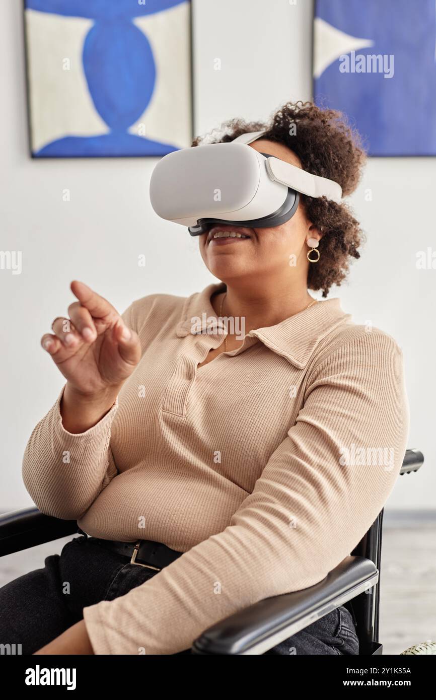 Disability Portrait Vertical portrait of African American woman with disability using VR ...
