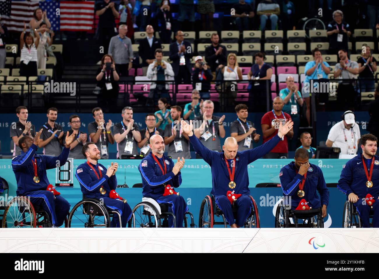 U.S. players pose with their gold medals after winning the wheelchair