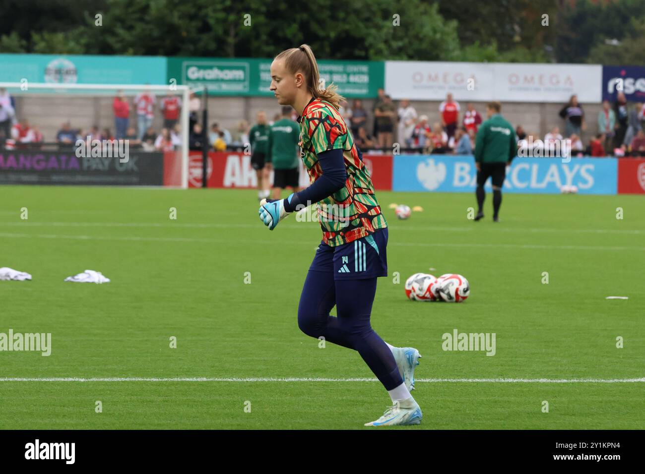 Borehamwood, UK. 07th Sep, 2024. Meadow Park, England, September 7th, 2024: New signing, Dutch goal keeper Daphne van Domselaar (14 Arsenal) warming up before the UEFA Champions League Round 1 match between Arsenal and Rosenborg at Meadow Park Stadium, Borehamwood, London, England on Saturday 7th September 2024. (Bettina Weissensteiner/SPP) Credit: SPP Sport Press Photo. /Alamy Live News Stock Photo