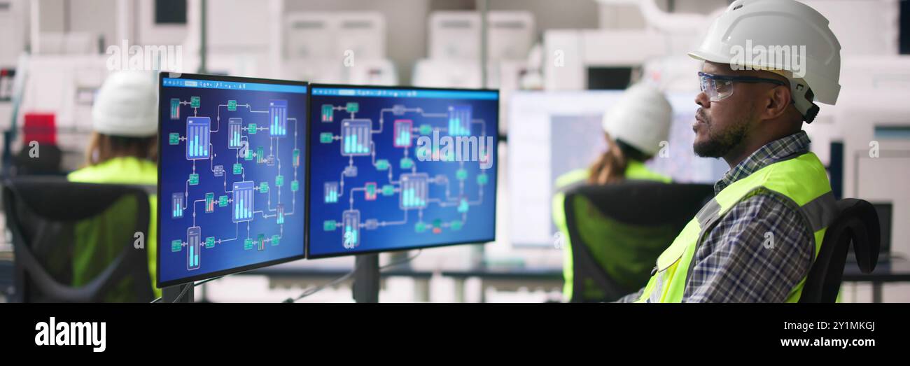 Engineer Operators Using Scada System At Industrial Plant Stock Photo