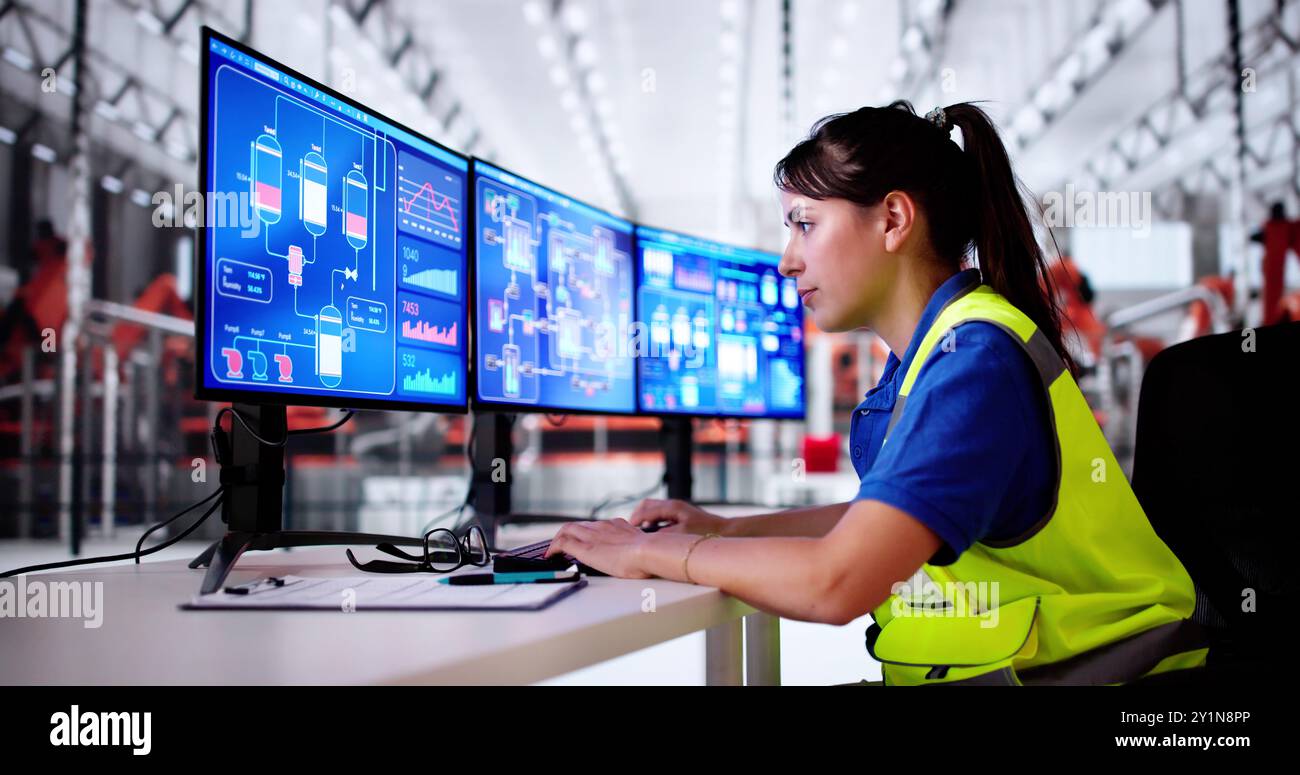 Industry Production Line Operator With Computer Monitor Stock Photo - Alamy