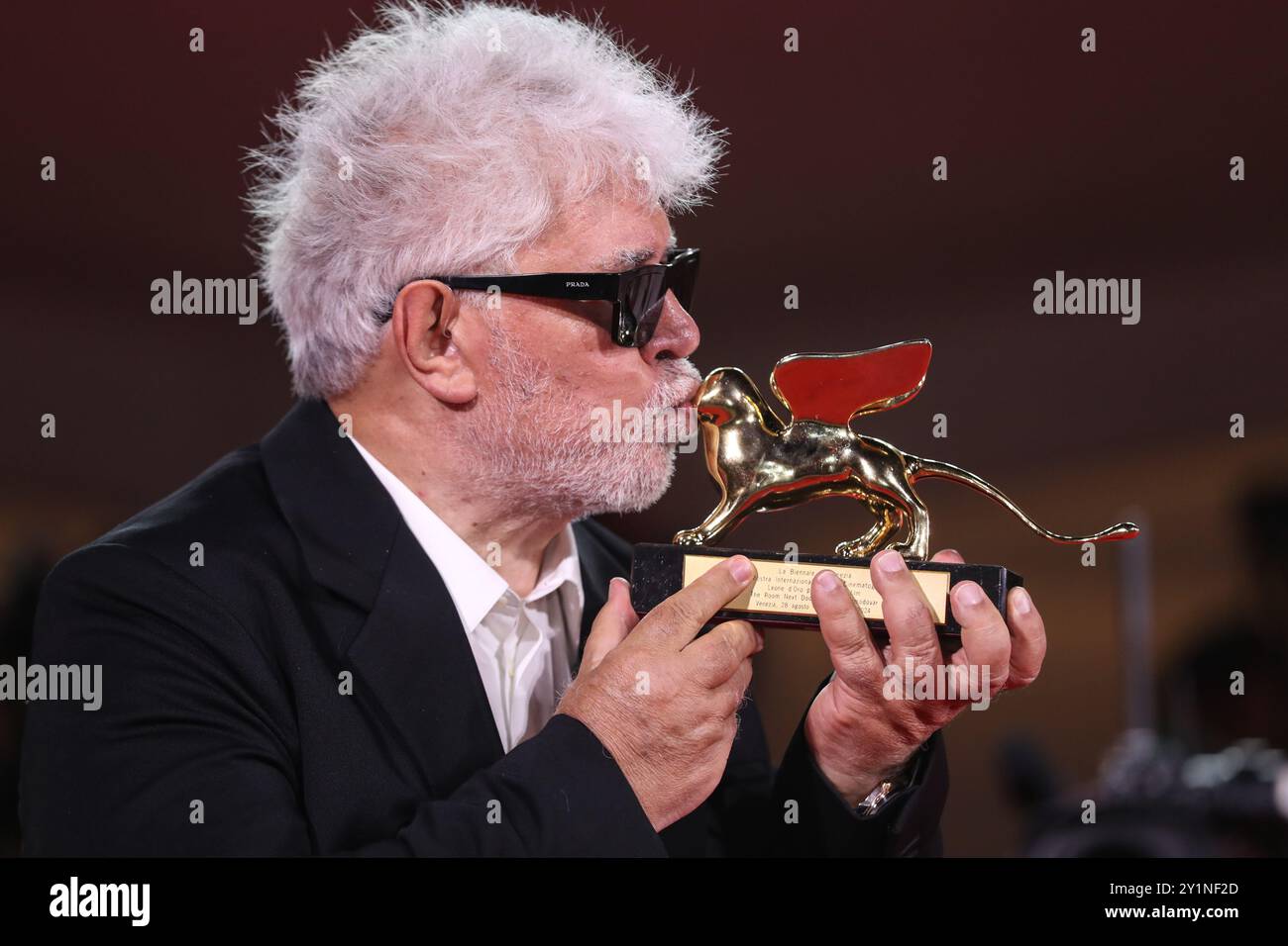 Venice, Italy. 7th Sep, 2024. Spanish director Pedro Almodovar kisses ...