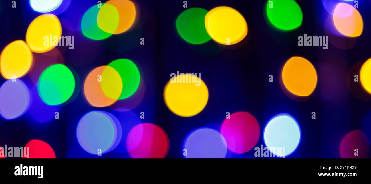 Blurred Bokeh Multi-Colored Abstract Lights Defocused Background with Vibrant Circular Patterns Stock Photo