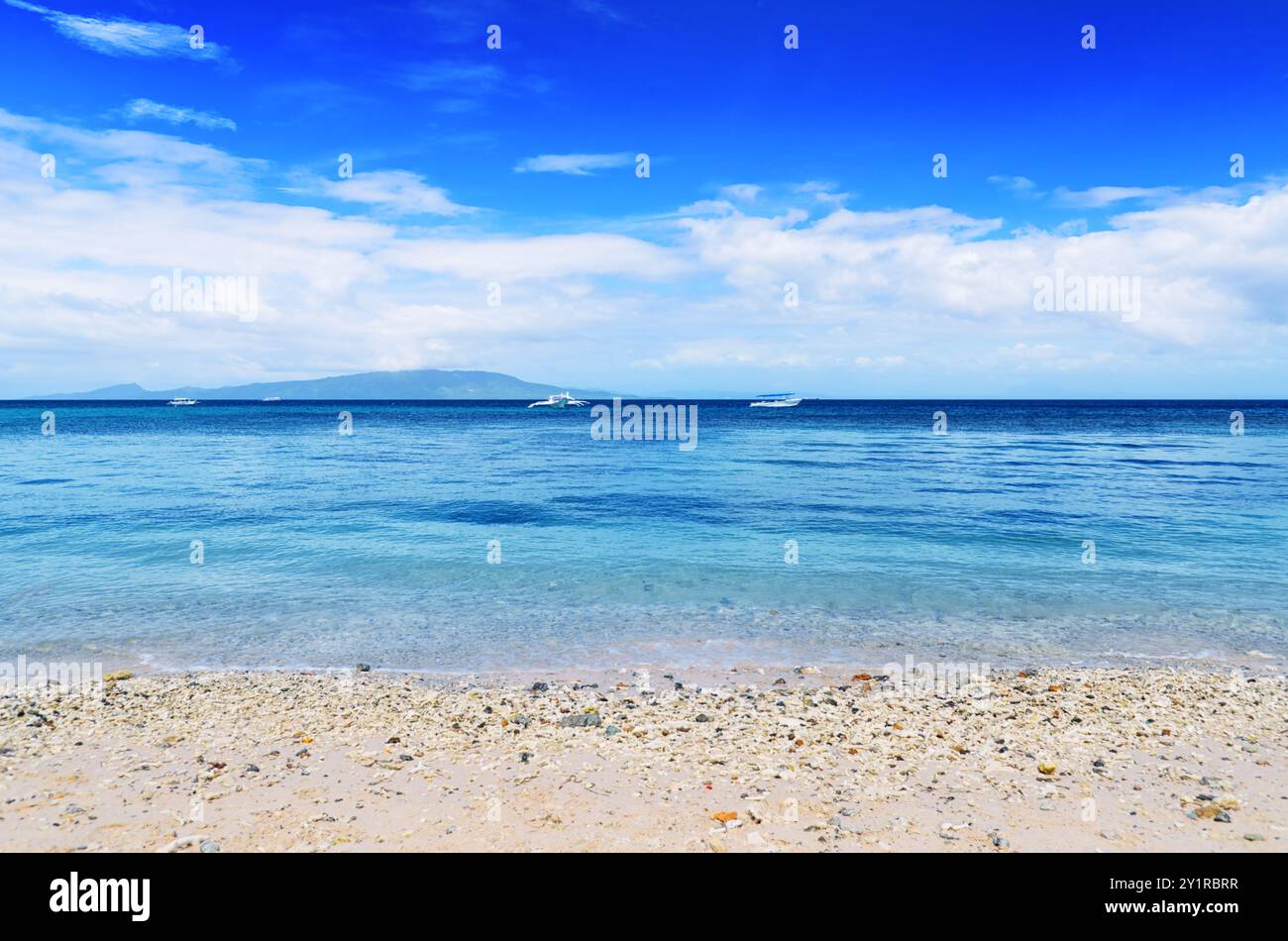 Tropical beach. Blue sky and clear water Stock Photo - Alamy