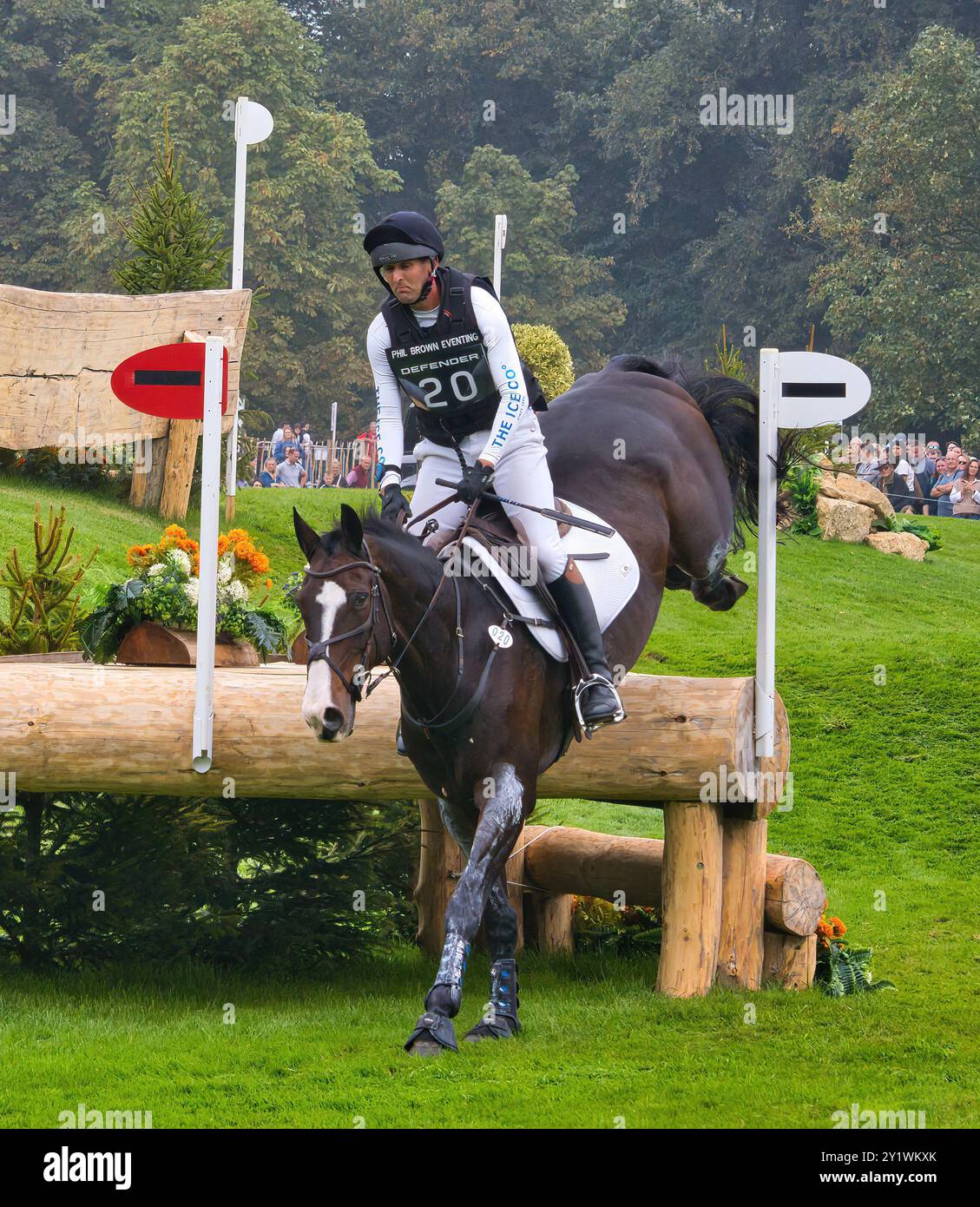 Philip Brown on Harry Robinson on the cross country course of Burghley