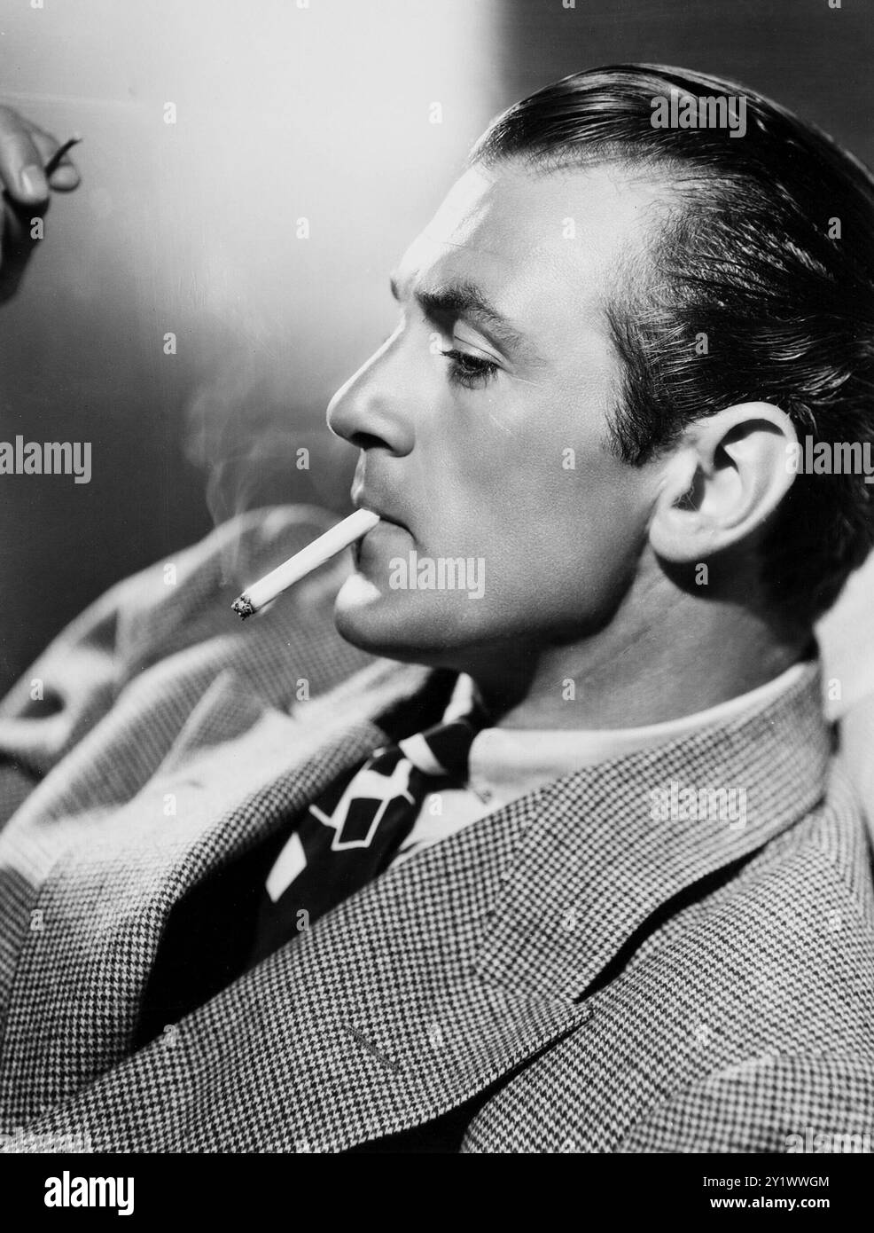 Gary Cooper (MGM) publicity photo by Clarence Sinclair Bull Stock Photo