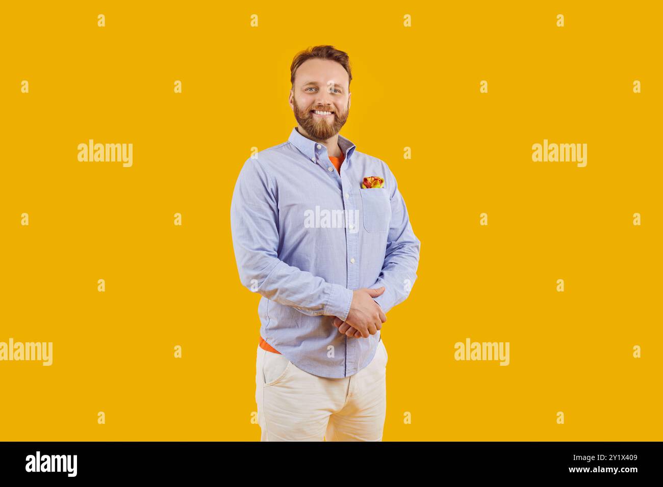 Person in orange shirt hi-res stock photography and images - Alamy