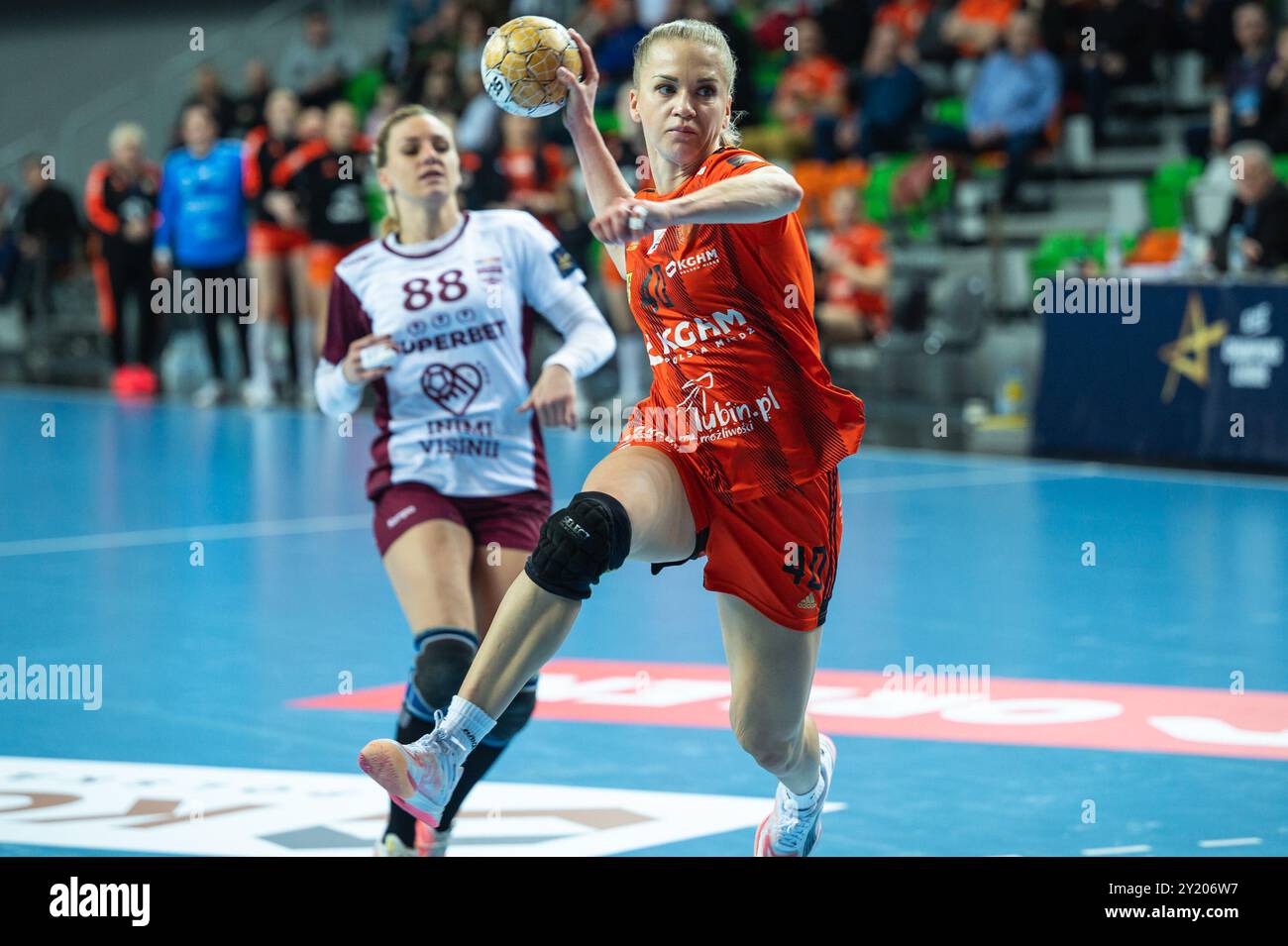 LUBIN, POLAND - FEBRUARY 10, 2024: Handball EHF Champions League women match KGHM MKS Zaglebie Lubin  - CS Rapid Bucuresti. In action Michalak Daria. Stock Photo