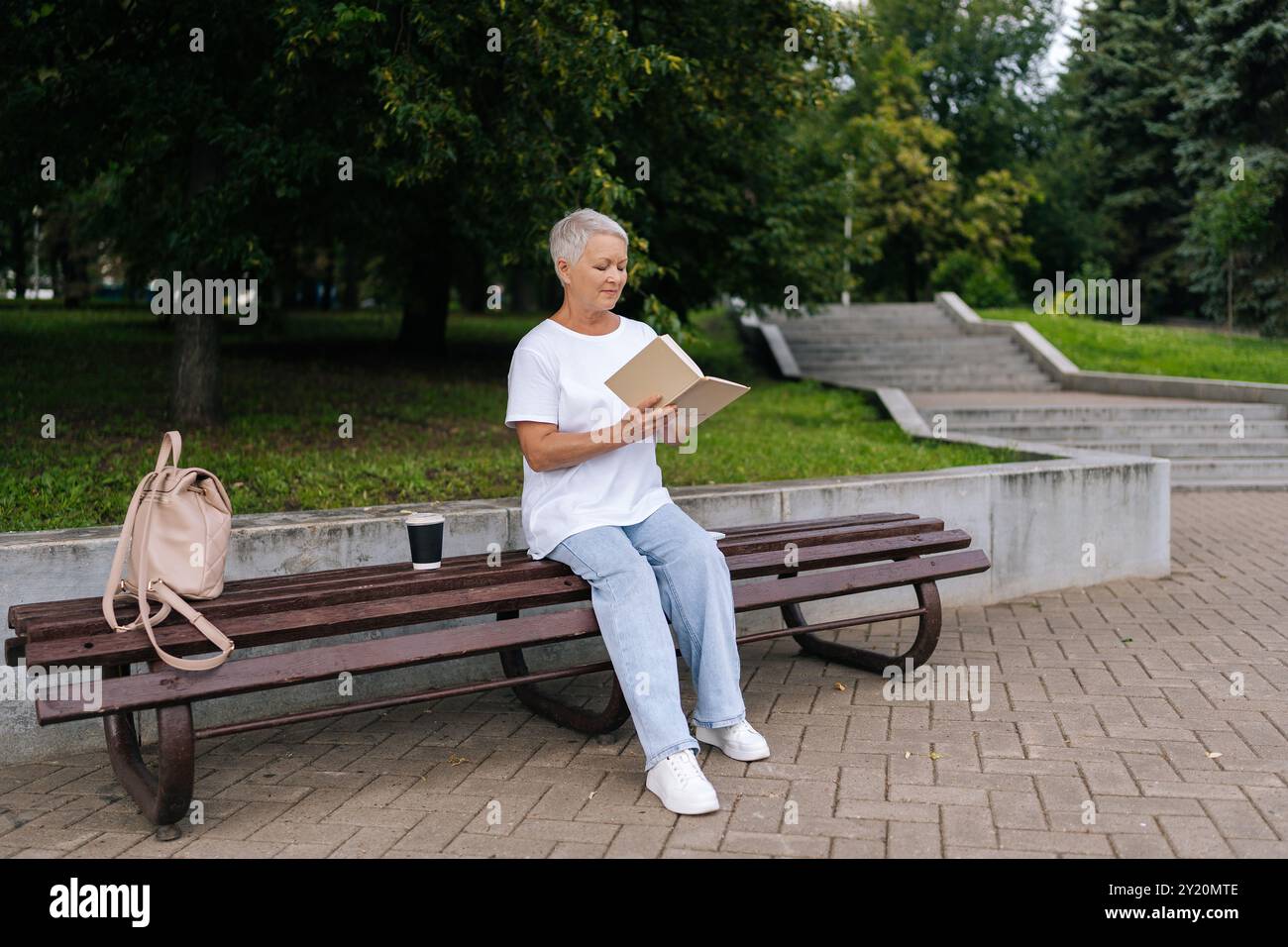 Beautiful older woman full length hi-res stock photography and images ...