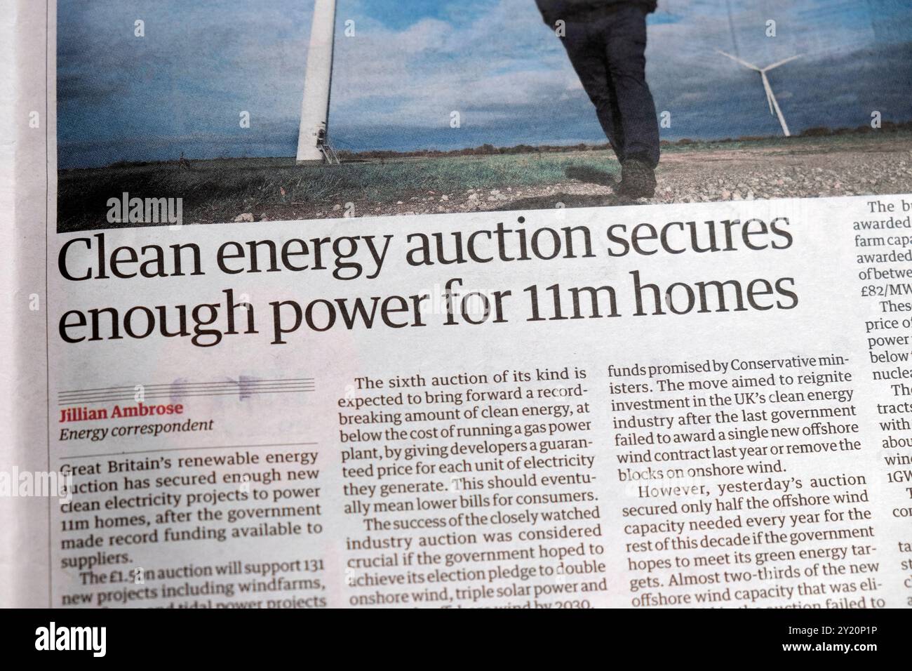 'Clean energy auction secures enough power for 11m homes' Guardian newspaper headline renewables article4 August 2024 London England UK Stock Photo