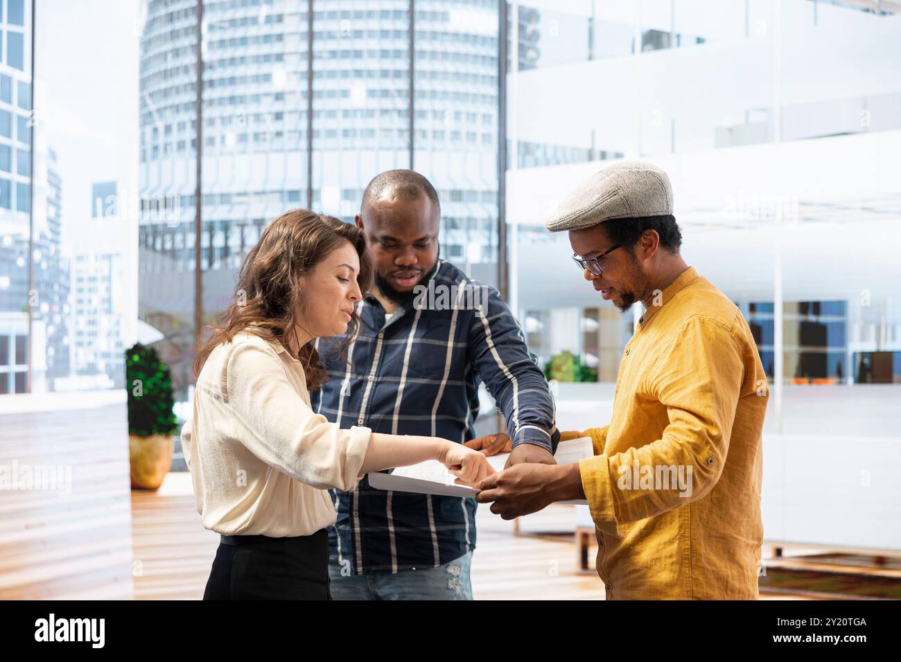 Professional team participates in an office tour with a real estate ...