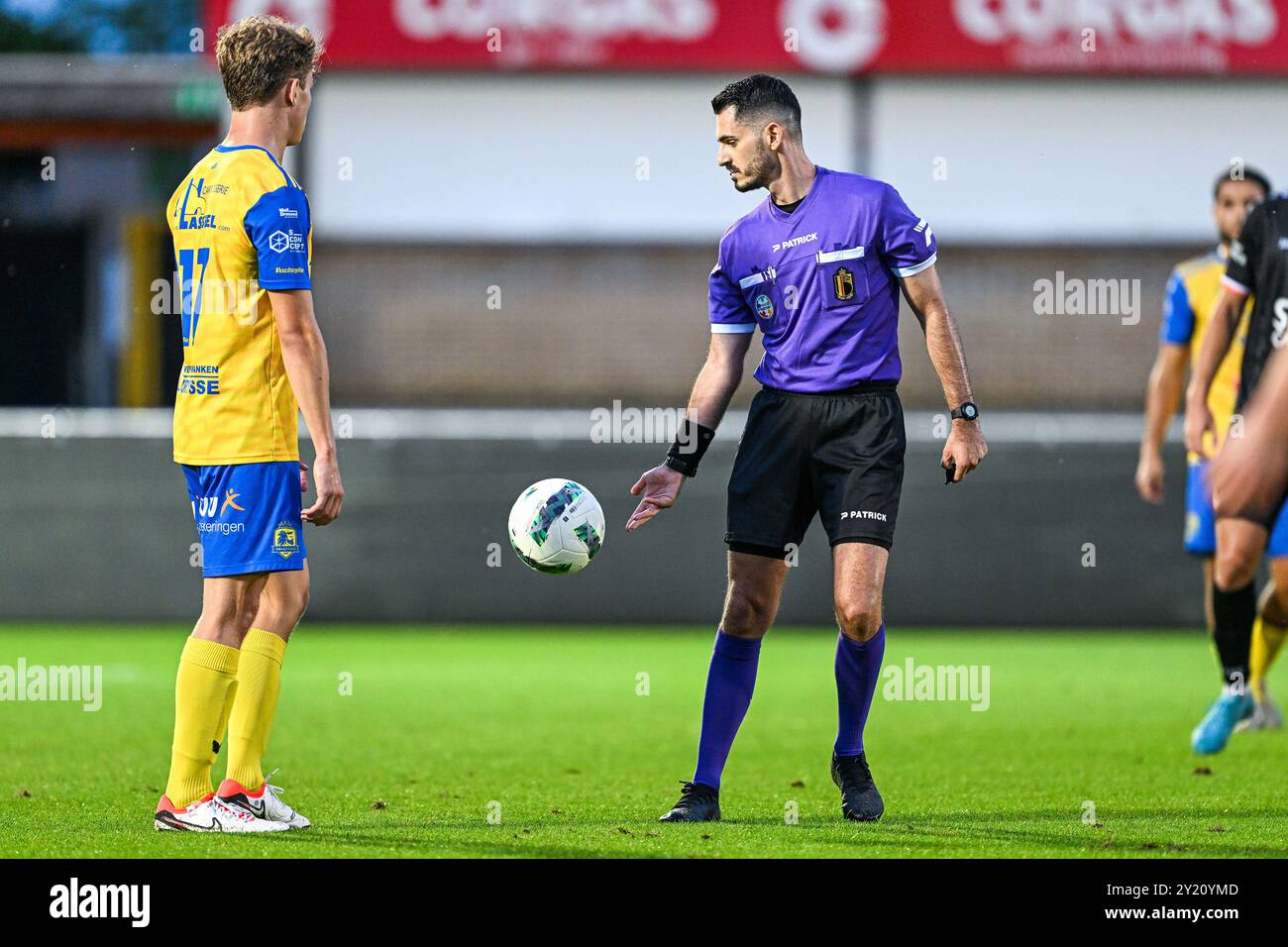 referee Ermaild Mataj pictured during a soccer game between KMSK Deinze and Dikkelvenne during the 1st round in the Croky Cup 2024-2025 season , on  Sunday 8 September 2024  in Deinze , Belgium . PHOTO SPORTPIX | Stijn Audooren Stock Photo