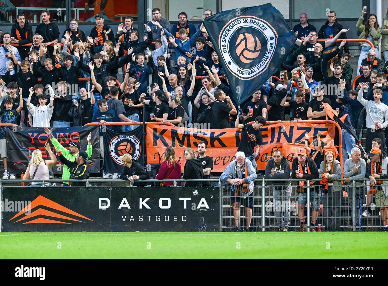 fans and supporters of Deinze pictured during a soccer game between KMSK Deinze and Dikkelvenne during the 1st round in the Croky Cup 2024-2025 season , on  Sunday 8 September 2024  in Deinze , Belgium . PHOTO SPORTPIX | Stijn Audooren Stock Photo