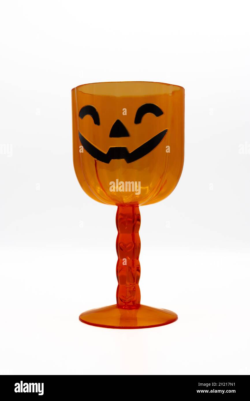 Orange halloween empty plastic cup isolated on a white background Stock Photo