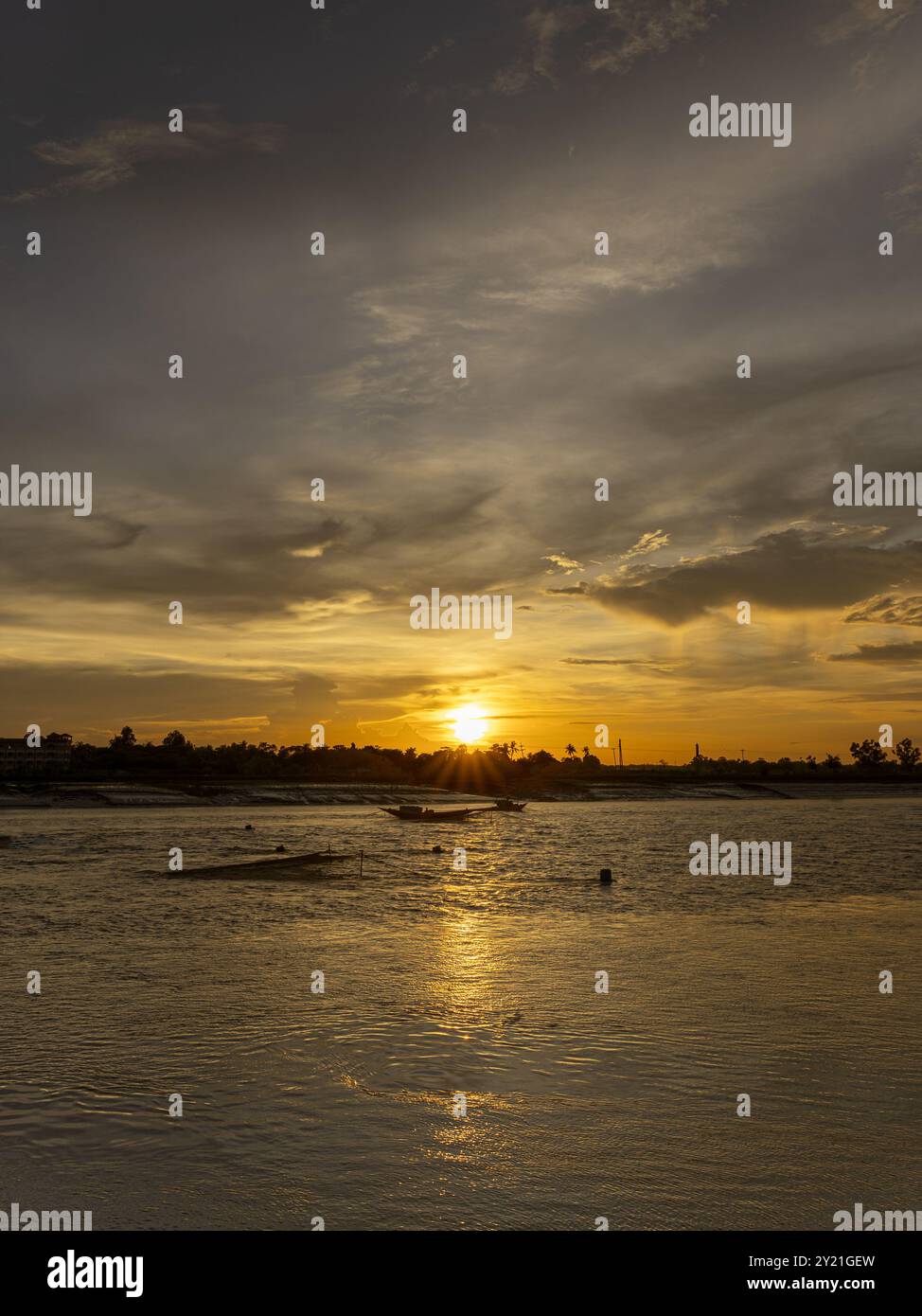 A beautiful sunset over river. Stock Photo