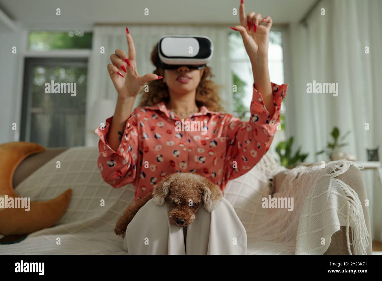 Woman Using Virtual Simulation At Home Stock Photo