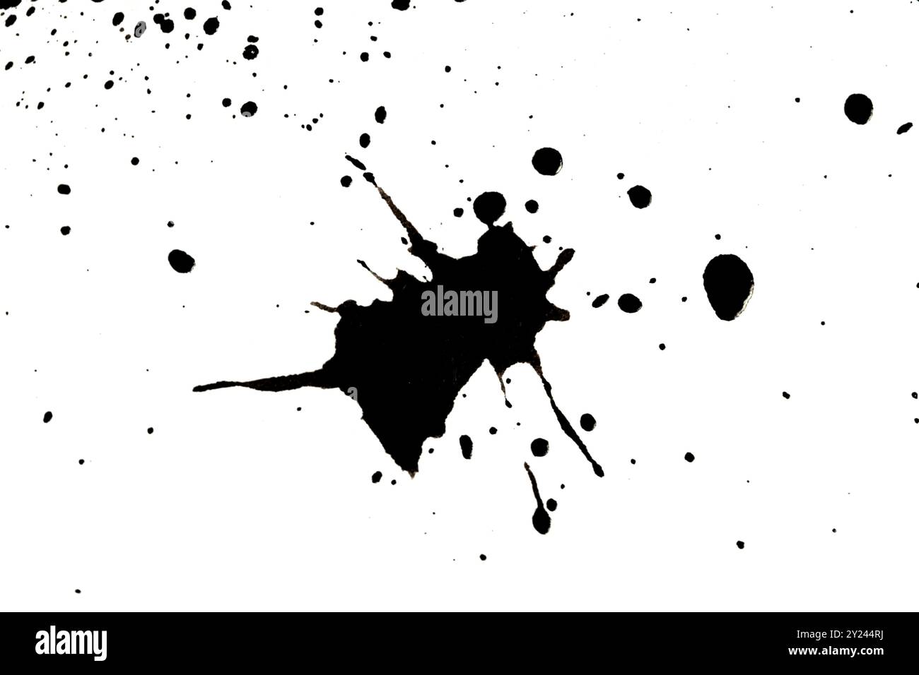 Black ink splashes on white background. Ink blots Stock Photo
