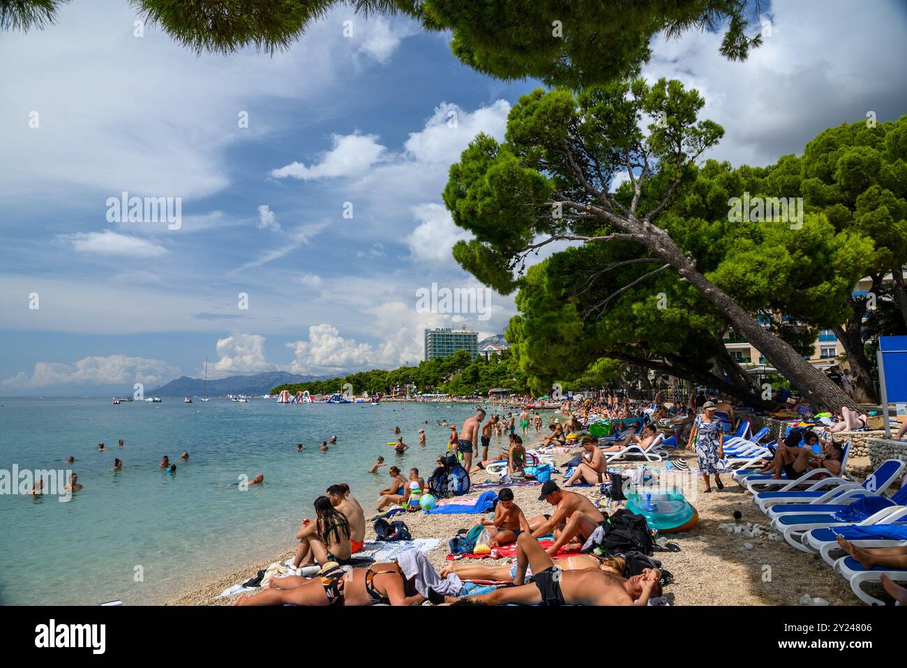 People Sunbathing On A Beach In Makarska Riviera On The Adriatic Sea people-sunbathing-on-a-beach-in-makarska-riviera-on-the-adriatic-sea