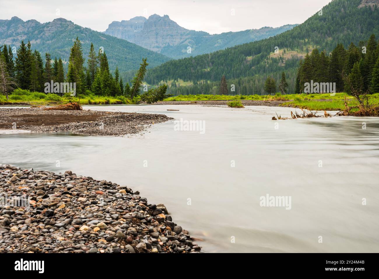 Serene mountain stream flowing through hi-res stock photography and ...
