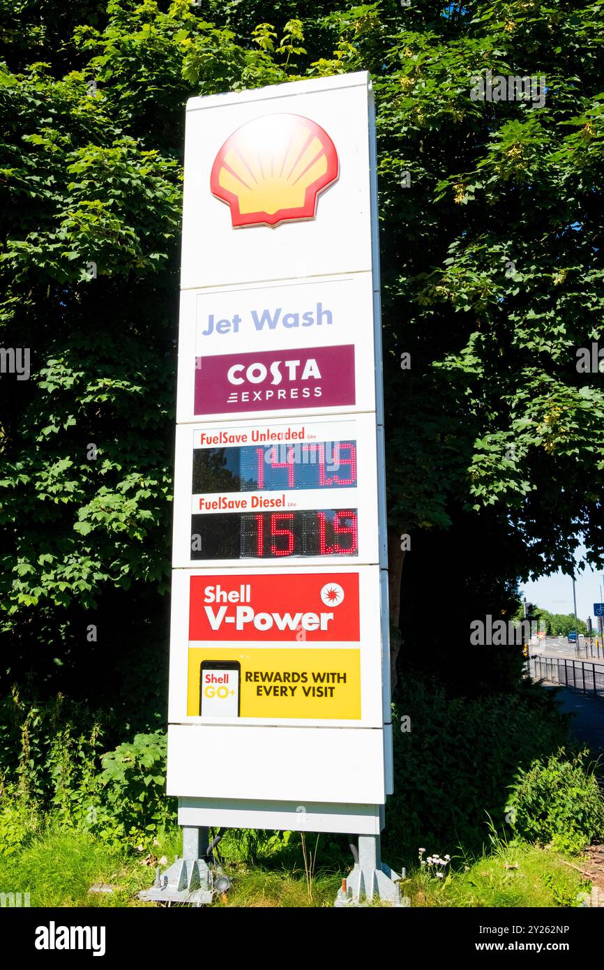 Newcastle UK 8th July 2024 Fuel prices displayed at a Shell petrol station with a jet wash service in a sunny outdoor setting near Scotswood Road Stock Photo Alamy