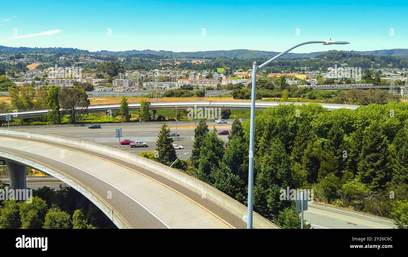 San Francisco, California, USA. August 2, 2024. Elevated highways surrounded by dense greenery near San Francisco International Airport. Stock Photo