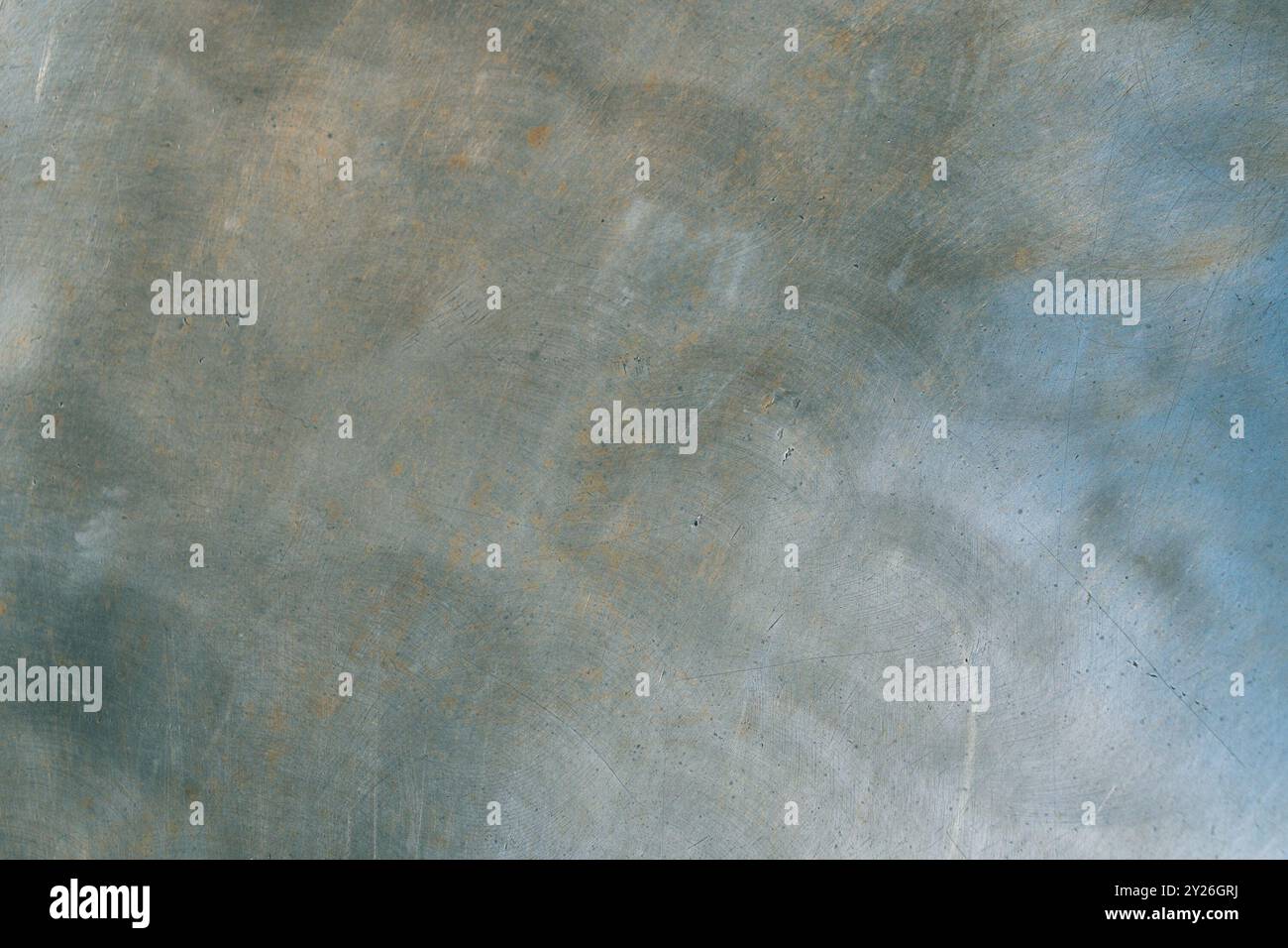Close-up of scratched and weathered metal surface. Backgrounds and textures. Stock Photo