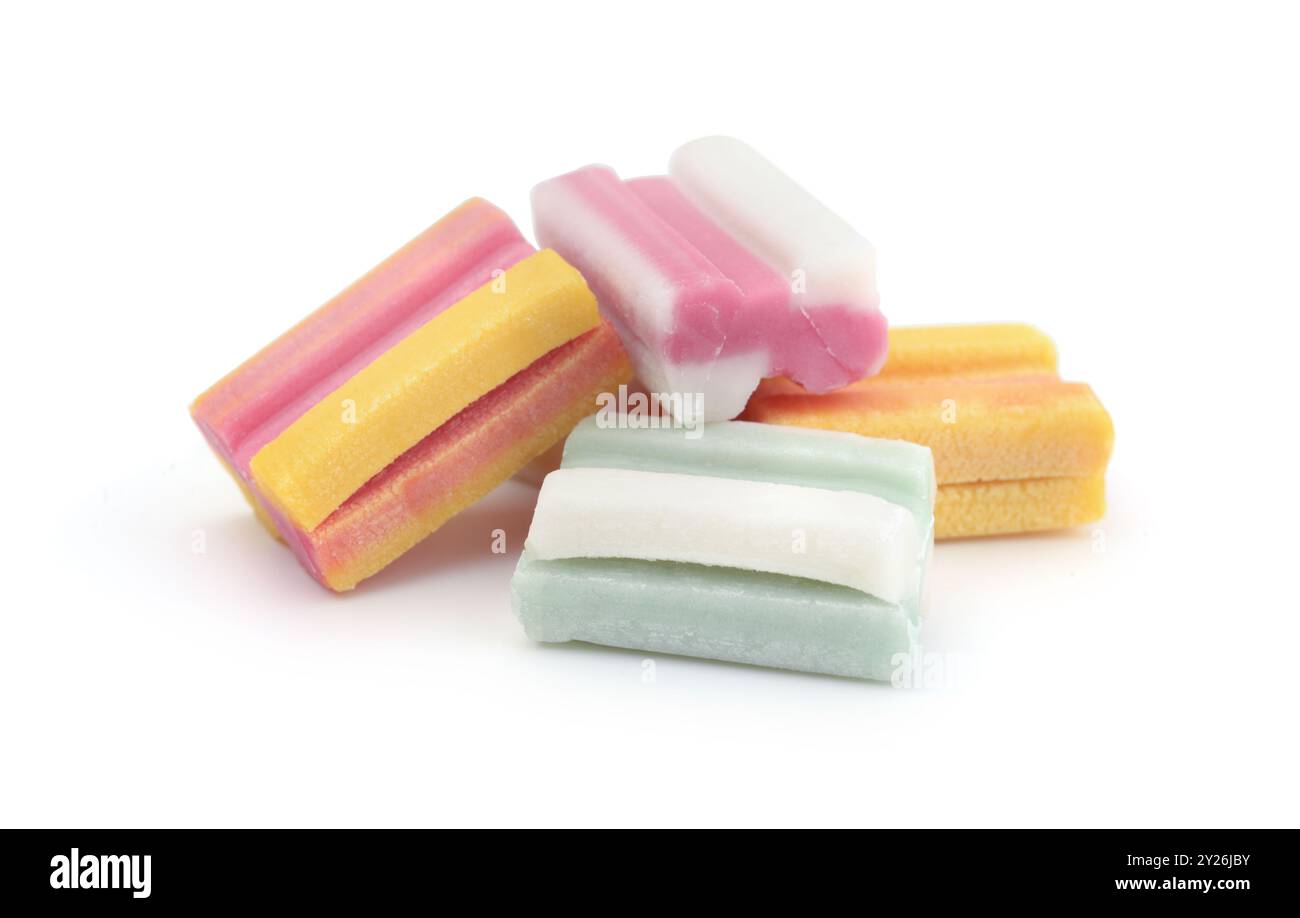 A pile of colorful chewing gum cubes isolated on white. Stock Photo
