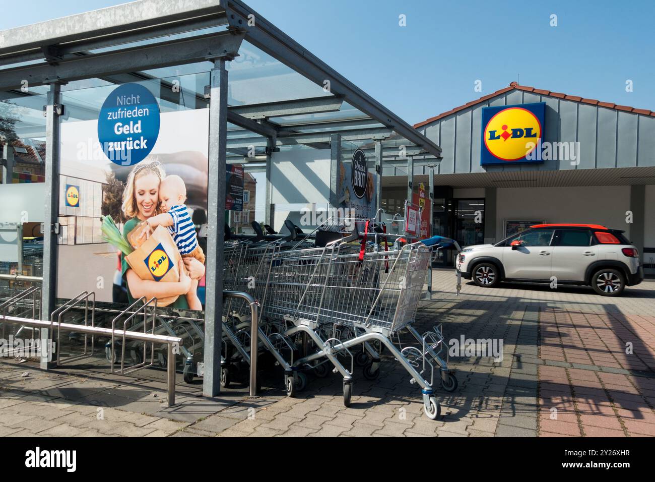 Lidl supermarket outside carts Germany Europe Stock Photo